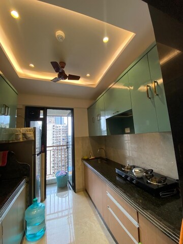 Kitchen in 1.5 BHK Apartment at MICL Aaradhya Highpark, Mira Road – for Sale