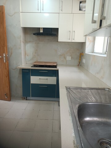 Kitchen in 4 BHK Apartment at 3C Lotus Panache, Sector 110 – for Rent