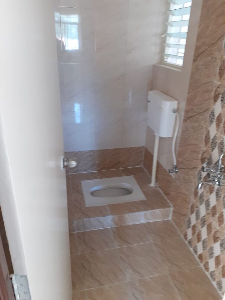 Bathroom, supertech-defence-colony-phase-ii 1 Bedroom 650 Sq.Ft. Apartment In Wagholi Pune 7431820