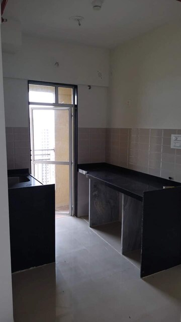 Kitchen in 1 BHK Apartment at JP North Aviva, Mira Road – for Sale