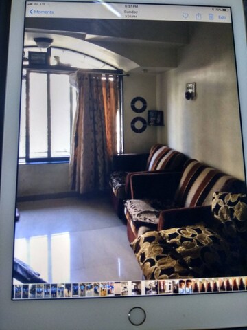 Living Room in 1 BHK Apartment at Hill View Garden, Dahisar East – for Sale