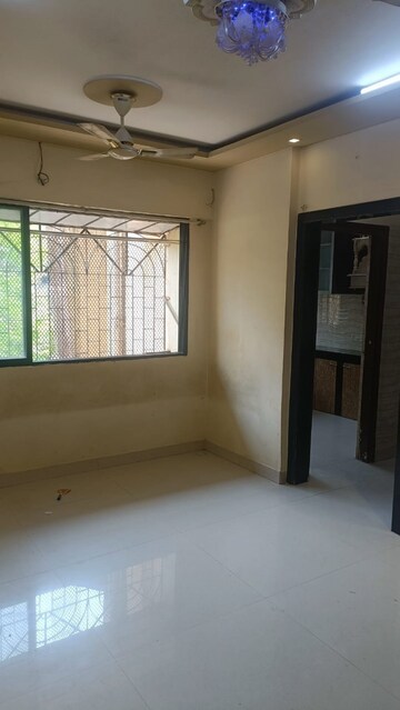 Room in 1 BHK Apartment at Raj Shivam Society, Dahisar East – for Sale
