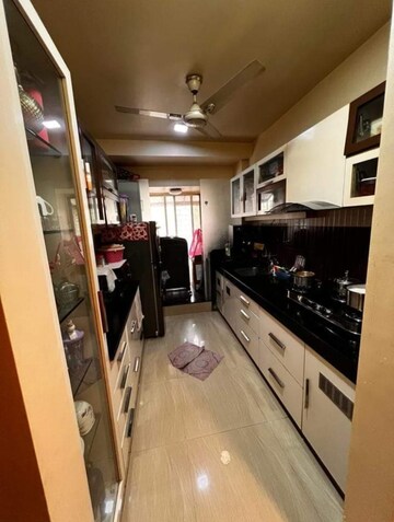Kitchen in 2 BHK Apartment at Palace Orchard CHS, Mohammadwadi – for Rent