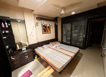 Bedroom in 2 BHK Apartment at Palace Orchard CHS, Mohammadwadi – for Rent
