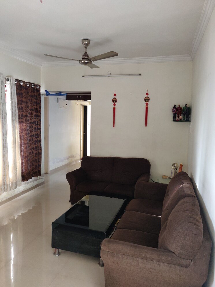 Living Room, shivam-serene-scapes 2 Bedroom 965 Sq.Ft. Apartment In Ravet Pune 7434937