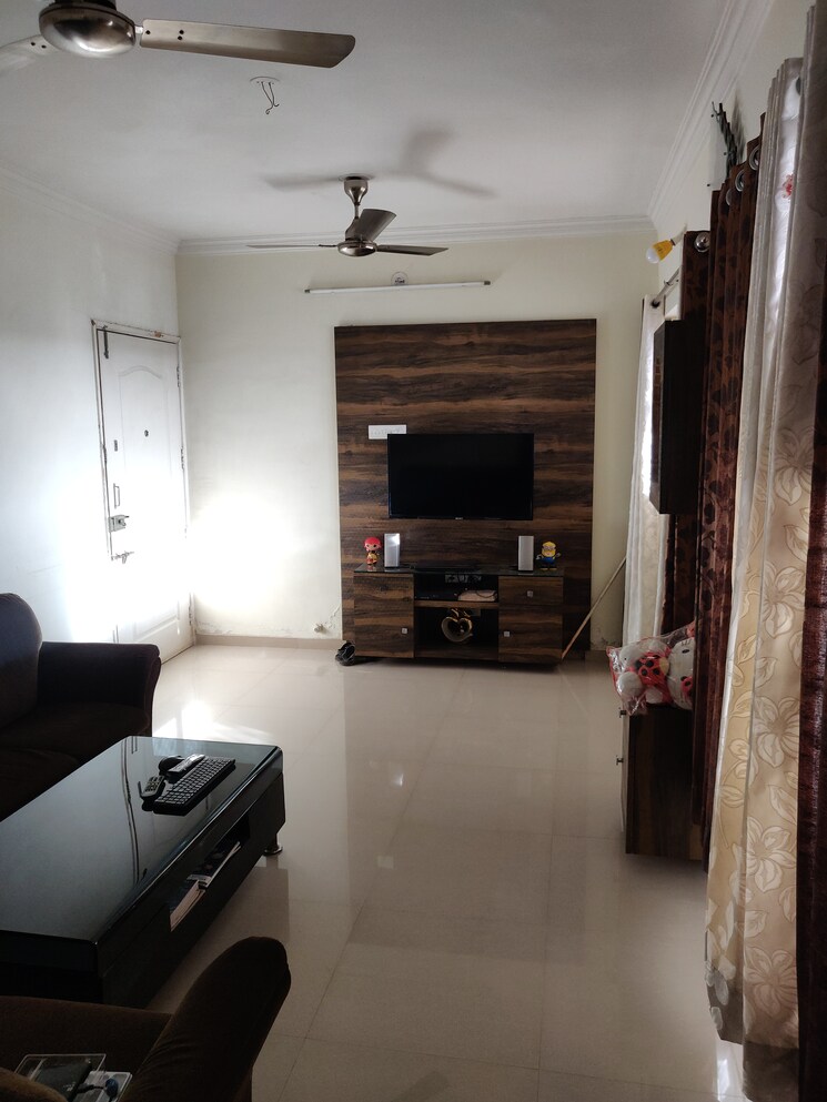 Living Room, shivam-serene-scapes 2 Bedroom 965 Sq.Ft. Apartment In Ravet Pune 7434937