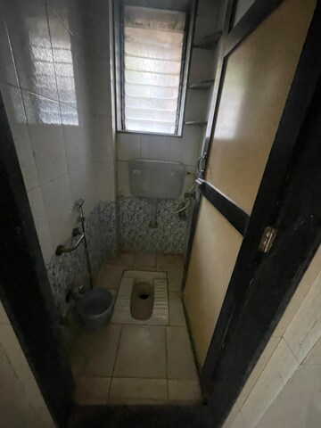 Bathroom in 1 BHK Apartment at Alaknanda CHS, Dahisar East – for Sale