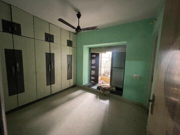 Bedroom in 1 BHK Apartment at Alaknanda CHS, Dahisar East – for Sale