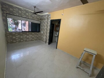 Living Room in 1 BHK Apartment at Alaknanda CHS, Dahisar East – for Sale