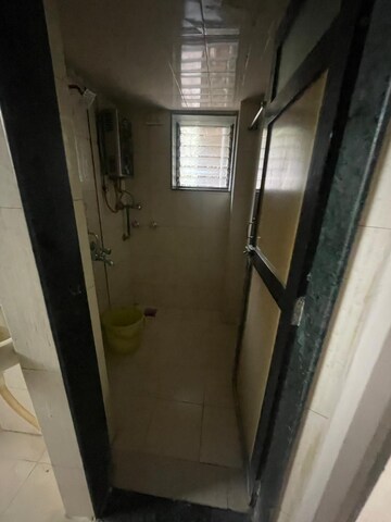 Bathroom in 1 BHK Apartment at Alaknanda CHS, Dahisar East – for Sale