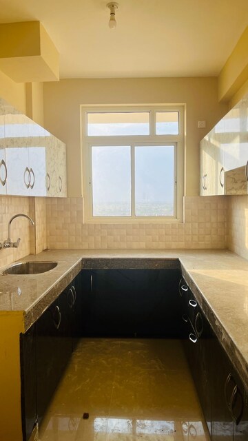 Kitchen in 3 BHK Apartment at Terra Elegance, Alwar Bypass Road – for Sale