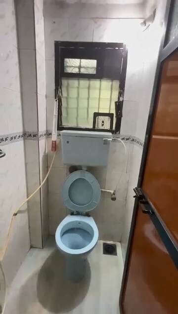 Bathroom in 1 BHK Apartment at Om Krishna CHS, Dahisar East – for Sale
