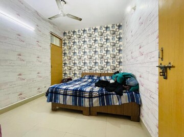Bedroom in 2 BHK Builder Floor at Chattarpur – for Sale