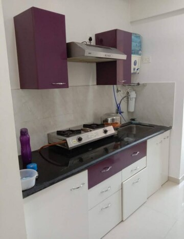 Kitchen in 1 BHK Apartment at Puranik Rumah Bali Phase II, Ghodbunder Road – for Sale