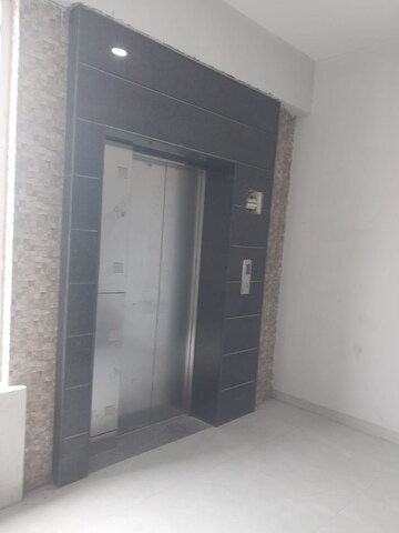 Building Lobby in 2 BHK Apartment at Green Valley Heights, Dhakoli Village – for Sale