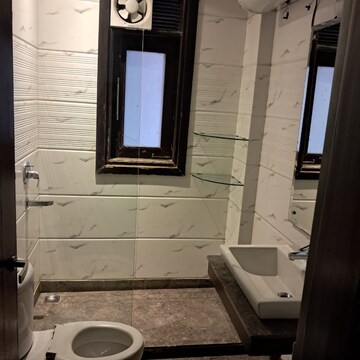 Bathroom in 4 BHK Builder Floor at Africa Avenue – for Sale
