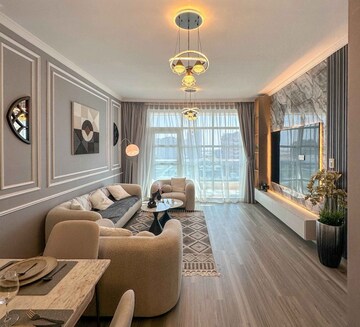 Living Room in 2 BHK Apartment at Transcon Triumph Tower, Andheri West – for Sale