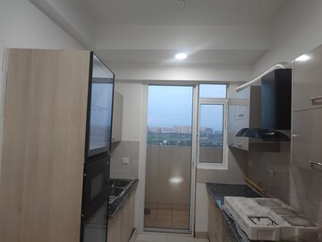 Kitchen in 3 BHK Apartment at Zeta I Greater Noida – for Sale