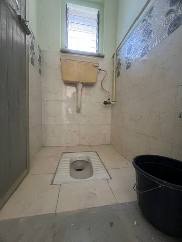 Bathroom in 1 BHK Apartment at Kharigaon – for Sale
