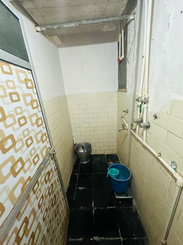 Bathroom in 1 RK Apartment at Mira Nagar – for Sale