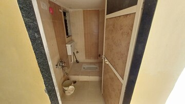 Bathroom in 2 BHK Apartment at Kalindi CHS Virar West, Virar West – for Rent