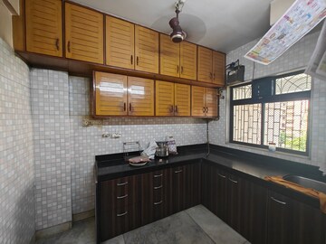 Kitchen in 2 BHK Apartment at Individual CHS, Seawoods – for Sale