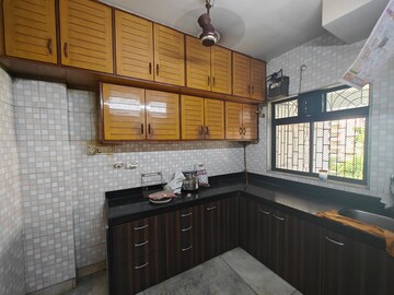 Kitchen in 2 BHK Apartment at Individual CHS, Seawoods – for Sale