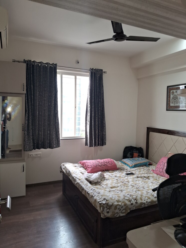Bedroom, gera-song-of-joy 2 Bedroom 1230 Sq.Ft. Apartment In Kharadi Pune 7440015
