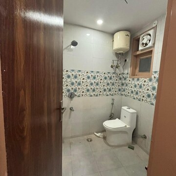 Bathroom in 1.5 BHK Builder Floor at Chattarpur – for Sale