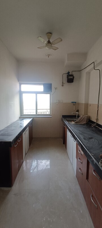 Kitchen in 2 BHK Apartment at Kalpataru Hills, Manpada – for Sale