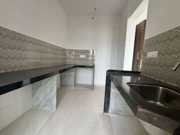 Kitchen in 2 BHK Apartment at Lodha Upper Thane, Anjur – for Sale