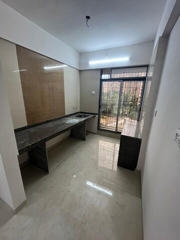 Kitchen in 2 BHK Apartment at Shri Krishna Trident A, Katrap – for Sale