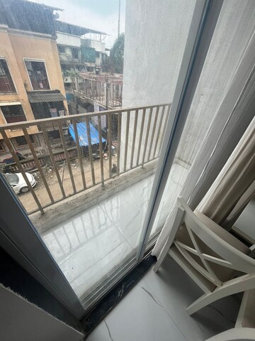 Balcony in 2 BHK Apartment at Trimurti CHS Badlapur, Kulgaon – for Sale