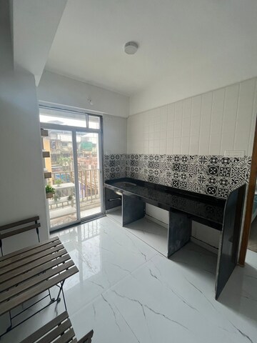 Kitchen in 2 BHK Apartment at Trimurti CHS Badlapur, Kulgaon – for Sale
