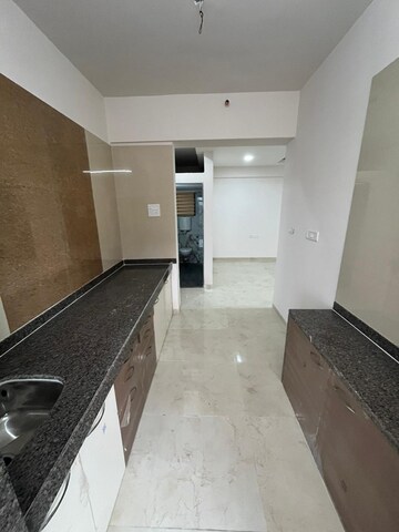Kitchen in 1 BHK Apartment at Shri Krishna Trident A, Katrap – for Sale