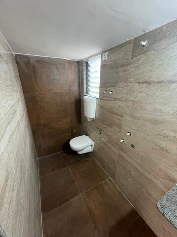 Bathroom in 1 BHK Apartment at Shri Krishna Trident A, Katrap – for Sale