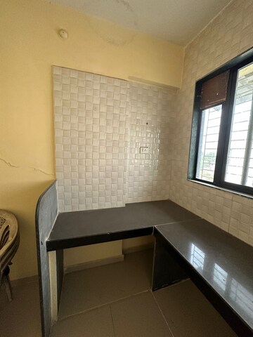 Kitchen in 3 BHK Apartment at Nirmiti Garden, Umroli – for Sale