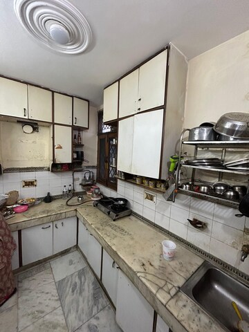 Kitchen in 2 BHK Apartment at Arihant Apartments Sahibabad, Ramprastha Colony – for Sale