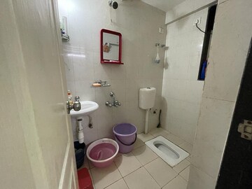 Bathroom in 2 BHK Apartment at Shapoorji Pallonji Sarova Complex, Kandivali East – for Sale