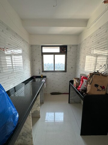 Kitchen in 2 BHK Apartment at Chandak Nishchay Wing F, Dahisar East – for Sale