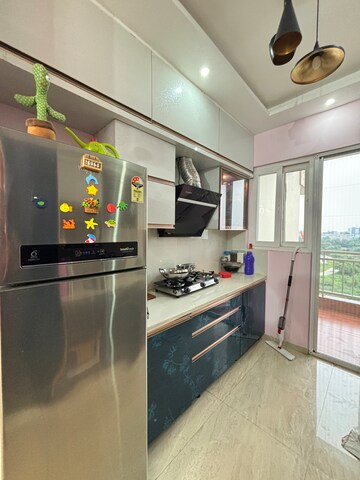 Kitchen in 2 BHK Apartment at Omega Windsor Greens, Faizabad Road – for Sale