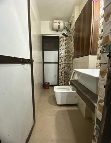 Bathroom in 2 BHK Apartment at STG Marigold Siddheshwar Garden, Dhokali – for Sale