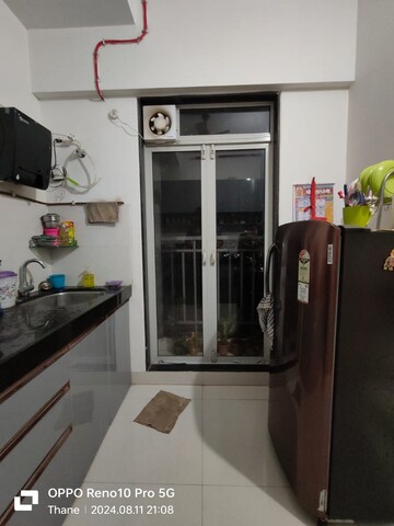 Kitchen in 2 BHK Apartment at Ashar Metro Towers, Vartak Nagar – for Sale