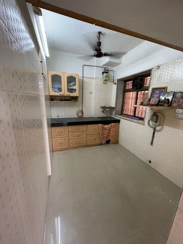 Kitchen in 2 BHK Apartment at Raj Umang 2, Dahisar East – for Sale