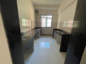Kitchen in 2 BHK Apartment at Sheth Midori, Dahisar East – for Sale
