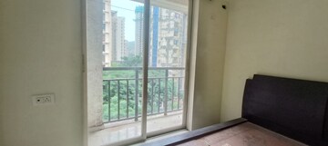 Room in 2 BHK Apartment at Rosa Gardenia, Ghodbunder Road – for Sale