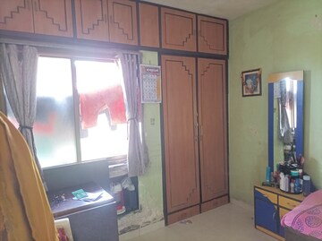 Bathroom in 1 BHK Apartment at Brahmand CHS, Brahmand – for Sale