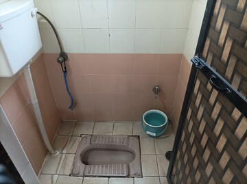Bathroom in 1 BHK Apartment at Brahmand CHS, Brahmand – for Sale