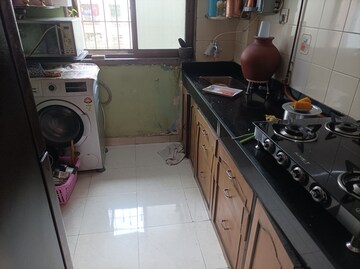 Kitchen in 1 BHK Apartment at Brahmand CHS, Brahmand – for Sale