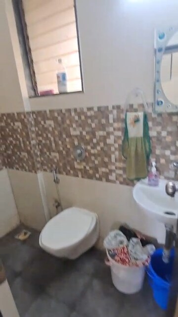 Bathroom in 2 BHK Apartment at Arch Gardens, Mira Road East – for Sale